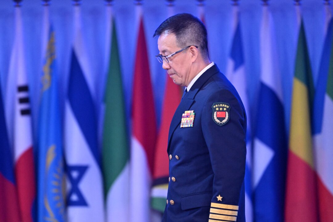 China’s Defense Minister Remains Visible Despite Diminished Status