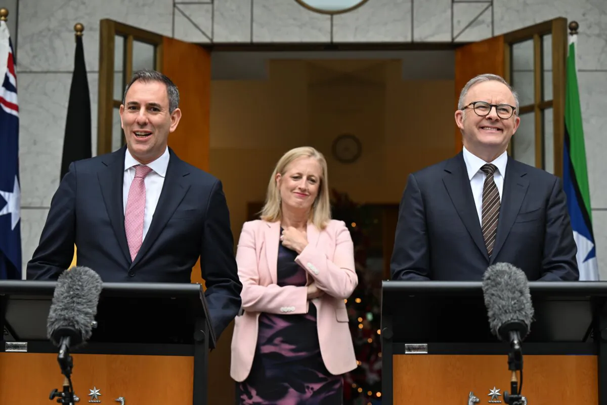 Australian Labor Treasurer Jim Chalmers, Finance Minister Katy Gallagher (C), and Prime Minister Anthony Albanese speak to the media during a press conference at Parliament House in Canberra, Australia on Nov. 29, 2024. (AAP Image/Lukas Coch)
