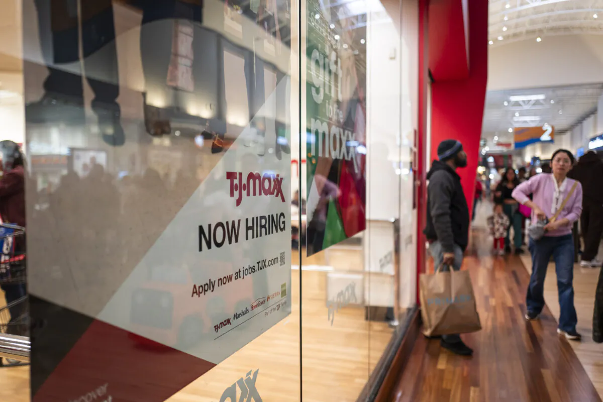 A now hiring sign during Black Friday at a mall in Hanover, Md., on Nov. 29, 2024. (Madalina Vasiliu/The Epoch Times)