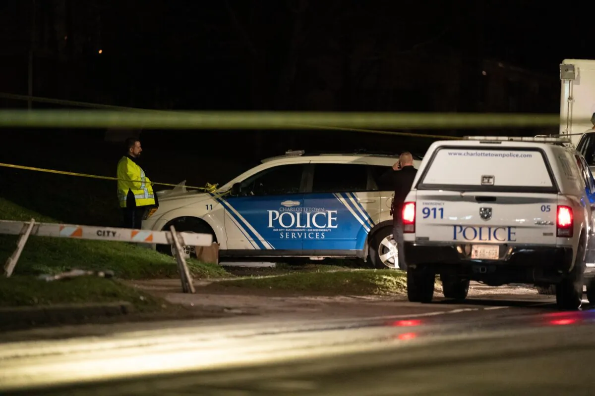 Police cordon off an area outside a home in Charlottetown, P.E.I, on May 1, 2021. (The Canadian Press/John Morris)