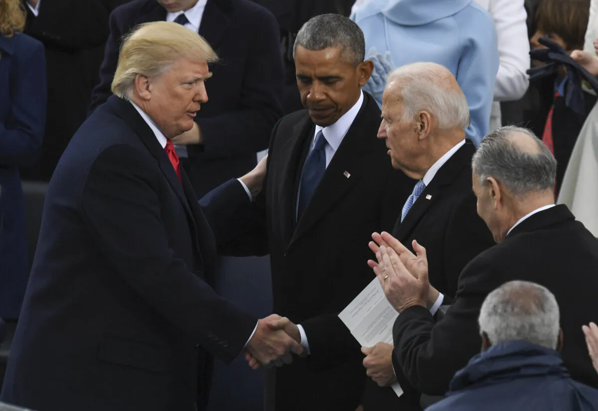 President Donald Trump (L) shakes hands with former President Barack Obama (C) and former Vice President Joe Biden after being sworn in as President at the Capitol in Washington on Jan. 20, 2017. (Mark Ralston/AFP via Getty Images)