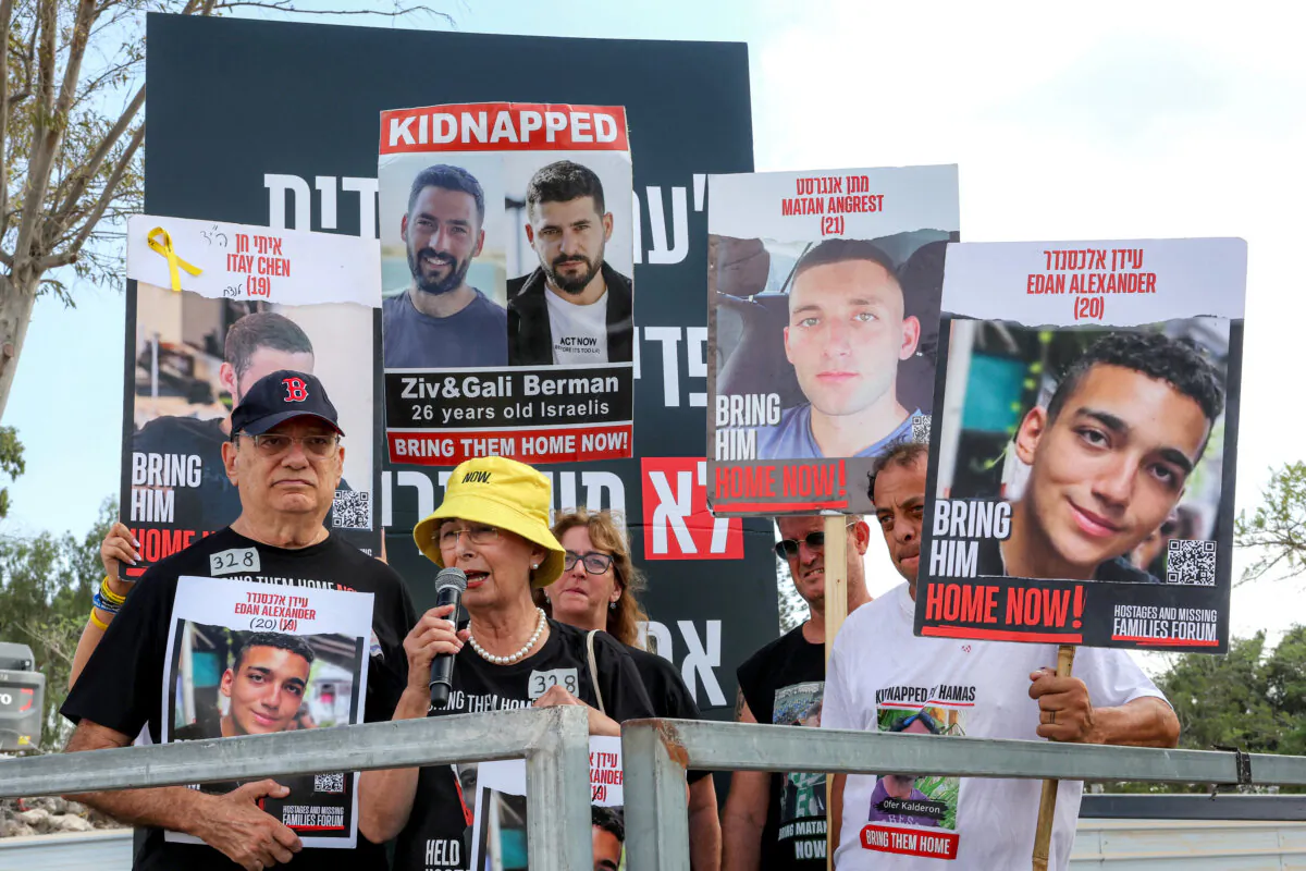 Relatives of Israeli-American hostage Edan Alexander speak during a demonstration calling for the release of hostages taken captive by Hamas, near Kibbutz Nirim, in southern Israel, on Aug. 29, 2024. (Jack Guez/AFP via Getty Images)