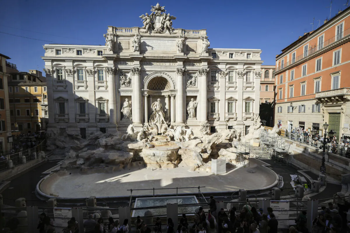A small pool in front of the Trevi Fountain to allow tourists to throw their coins in it, as the fountain has been emptied to undergo maintenance work that will last until around September 2025, in Rome on Nov. 1, 2024. (Andrew Medichini/AP Photo)