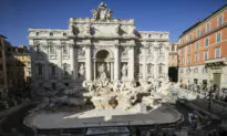 Tourists Toss Coins Over Makeshift Pool as Rome’s Trevi Fountain Undergoes Maintenance