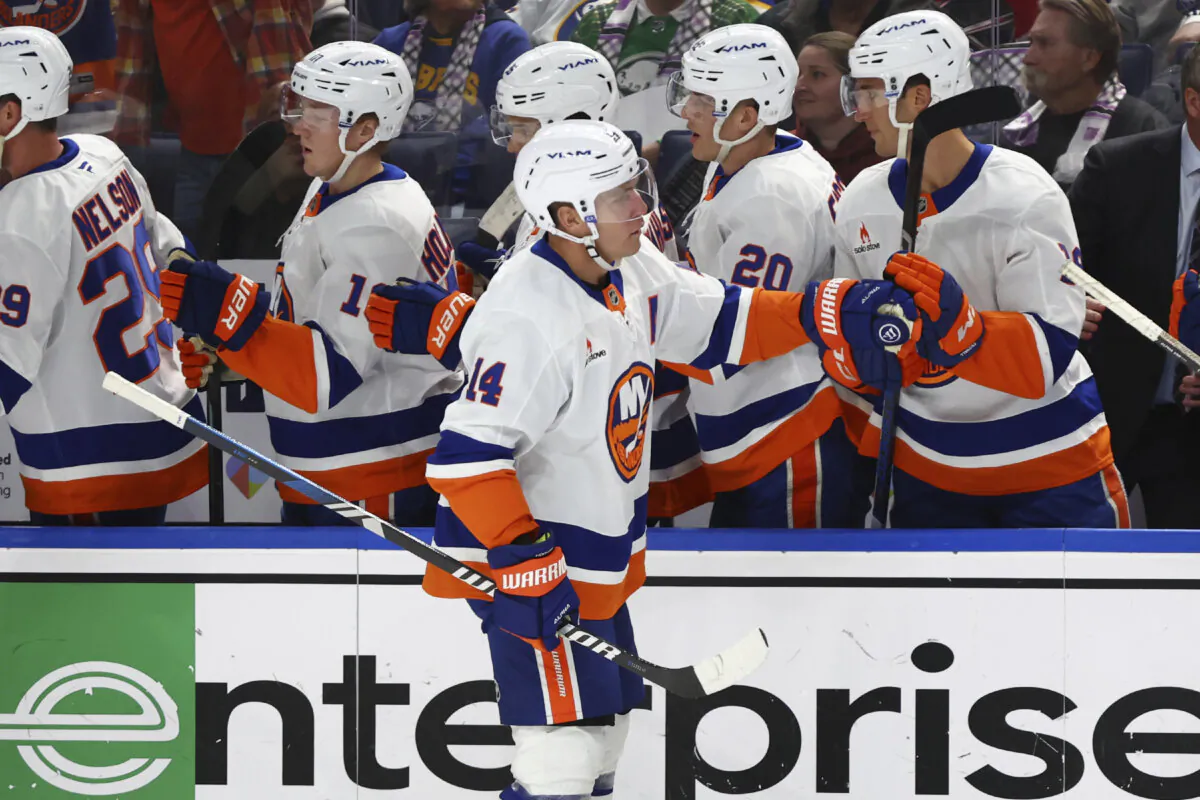 New York Islanders center Bo Horvat (14) celebrates his goal during the first period of an NHL hockey game against the Buffalo Sabres Friday, Nov. 1, 2024, in Buffalo, N.Y. (AP Photo/Jeffrey T. Barnes)