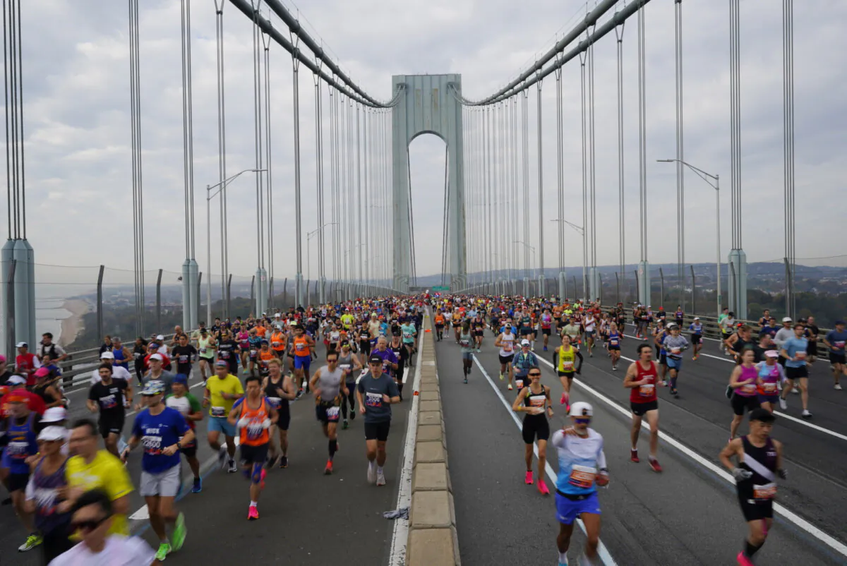 Runners cross the Verrazzano-Narrows Bridge at the start of the New York City Marathon, in New York, Sunday, Nov. 5, 2023. (Peter K. Afriyie/AP Photo)