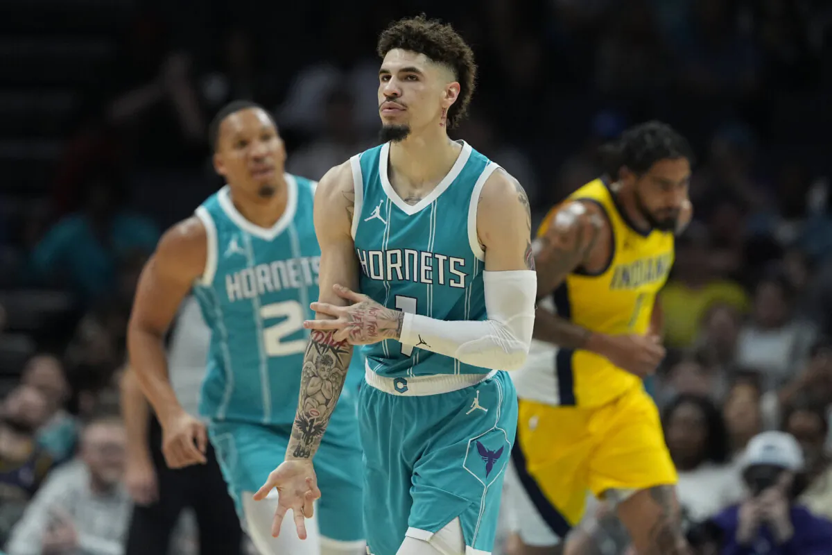 Charlotte Hornets guard LaMelo Ball celebrates after scoring against the Indiana Pacers during the first half of an NBA basketball game in Charlotte, N.C., on Nov. 8, 2024. (Chris Carlson/AP Photo)