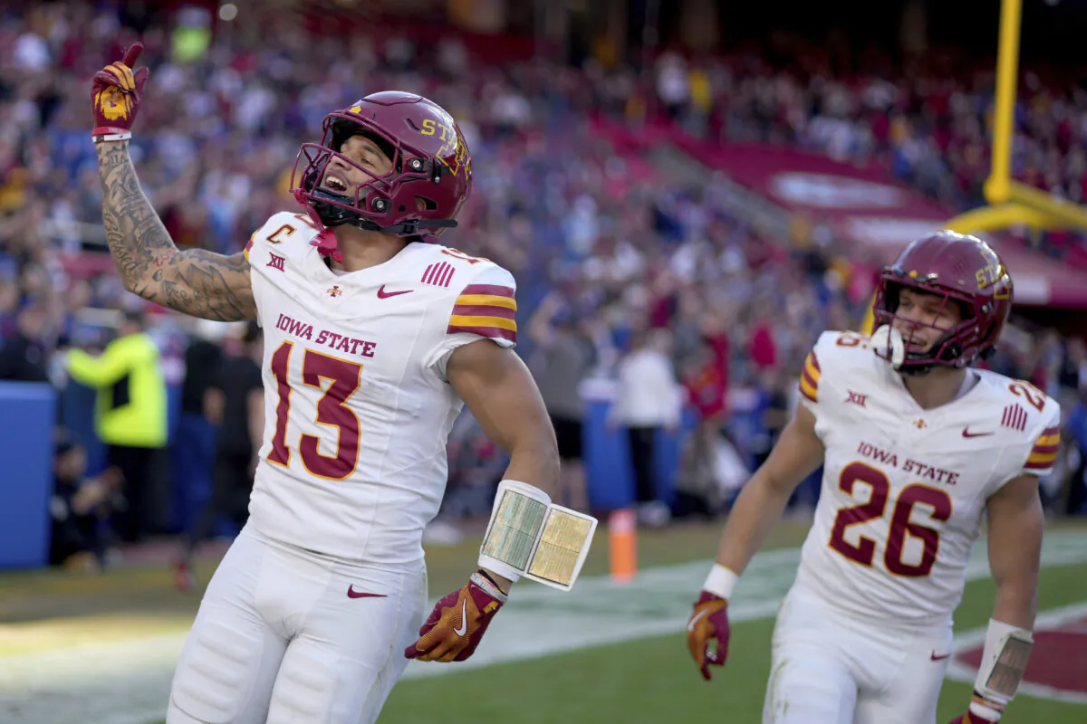 Iowa State wide receiver Jaylin Noel (13) celebrates after scoring a touchdown during the first half of an NCAA college football game against Kansas in Kansas City, Mo., on Nov. 9, 2024. (Charlie Riedel/AP Photo)