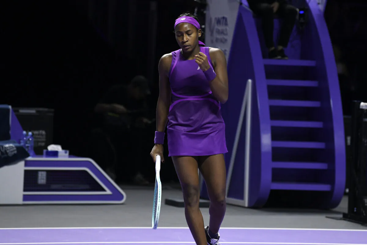 Coco Gauff of the U.S. celebrates a point against China's Qinwen Zheng during their women's singles final match of the WTA finals at the King Saud University Indoor Arena, in Riyadh, Saudi Arabia, Saturday, Nov. 9, 2024. (AP Photo)