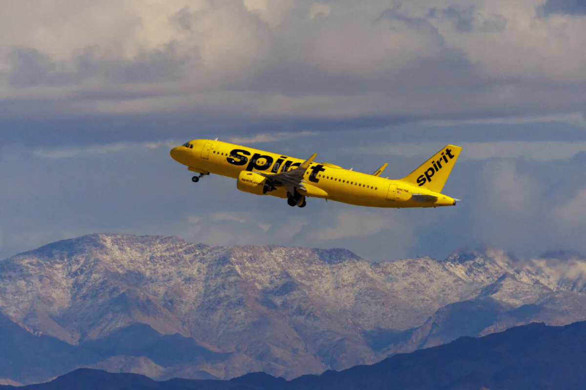 A Spirit Airlines commercial airliner flies after taking off from Las Vegas International Airport in Las Vegas, on Feb. 8, 2024. (Mike Blake/Reuters)