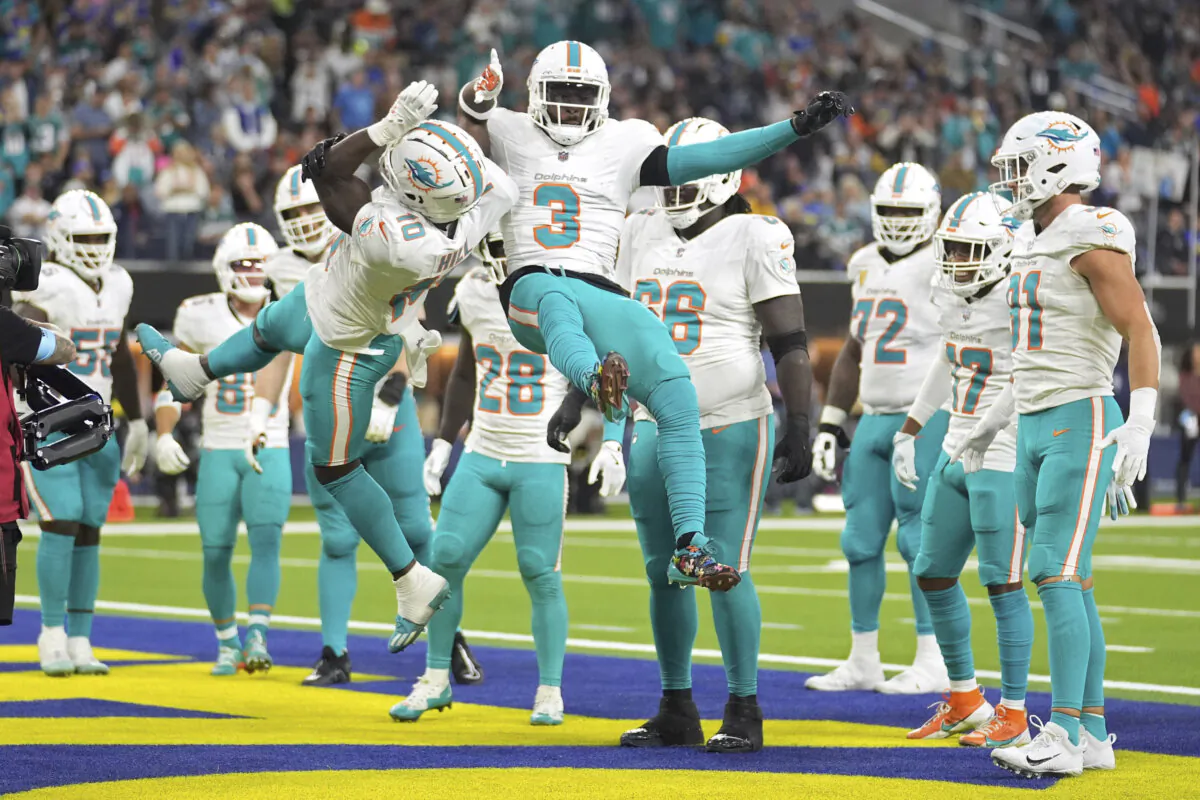 Miami Dolphins wide receiver Tyreek Hill, left, celebrates his touchdown with wide receiver Odell Beckham Jr. during the second half of an NFL football game against the Los Angeles Rams in Inglewood, Calif, on Nov. 11, 2024. (Marcio Jose Sanchez/AP Photo)