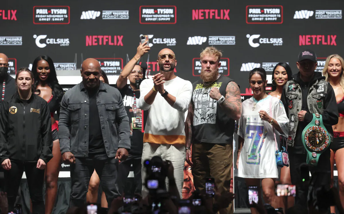 Jake Paul (R) faces off with Mike Tyson (L) during a press conference at The Pavilion at Toyota Music Factory in Irving, Texas, on Nov 13, 2024. (Kevin Jairaj/Imagn Images via Reuters)