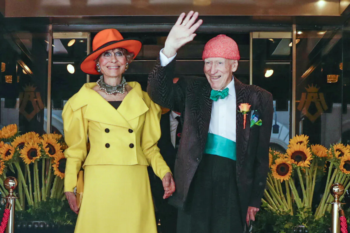 Businessman and billionaire Olav Thon (R) poses for a photo with Sissel Berdal Haga after their wedding at Hotel Bristol in Oslo, Norway, on June 21, 2019. (Berit Roald/NTB Scanpix via AP)
