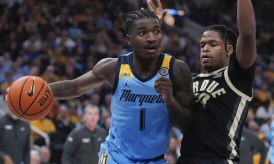 Kam Jones Gets Triple-Double as No. 15 Marquette Trounces No. 6 Purdue 76-58