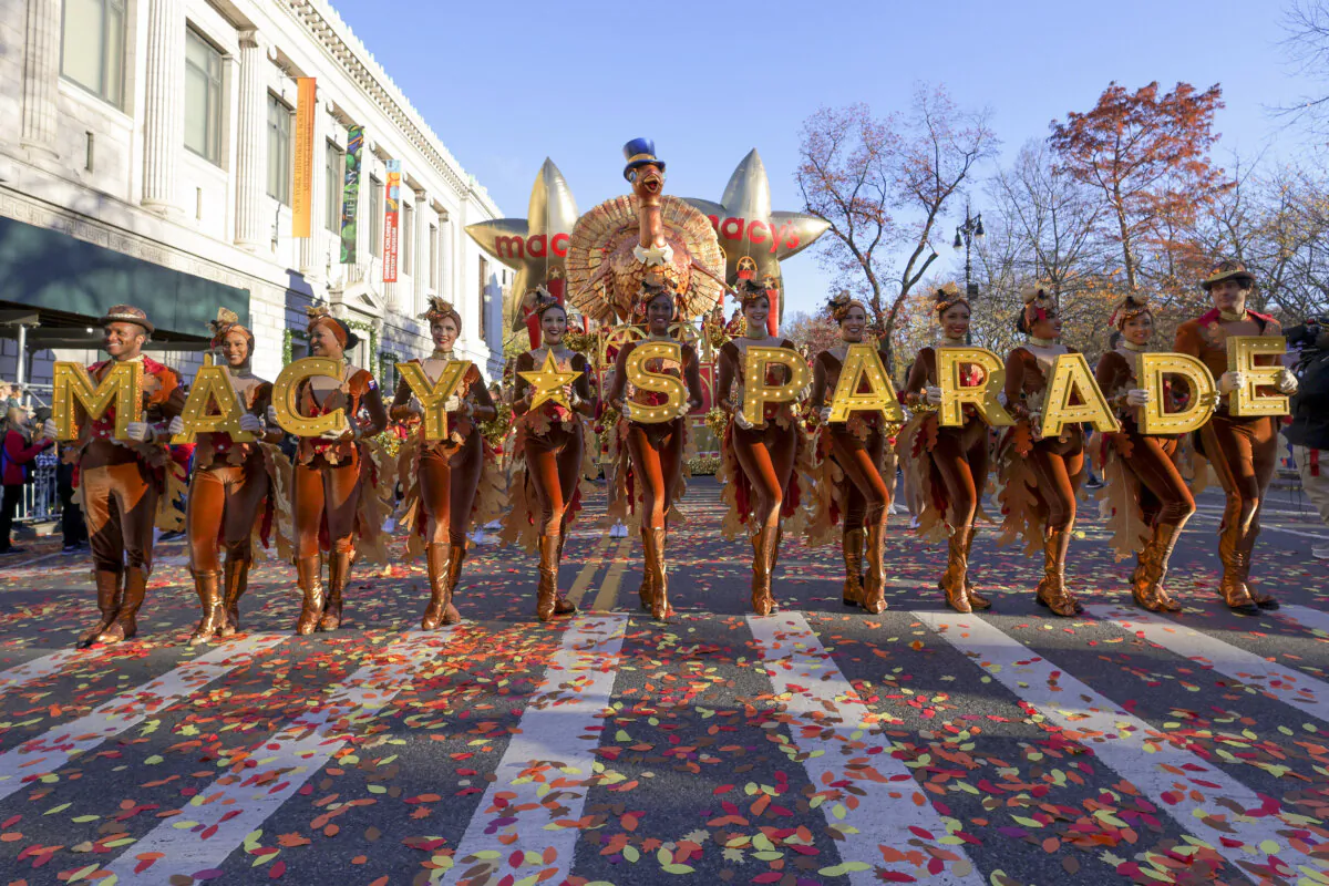 Parade performers lead the Tom Turkey float down Central Park West at the start of the Macy's Thanksgiving Day parade in New York on Nov. 23, 2023. (Jeenah Moon/AP Photo)
