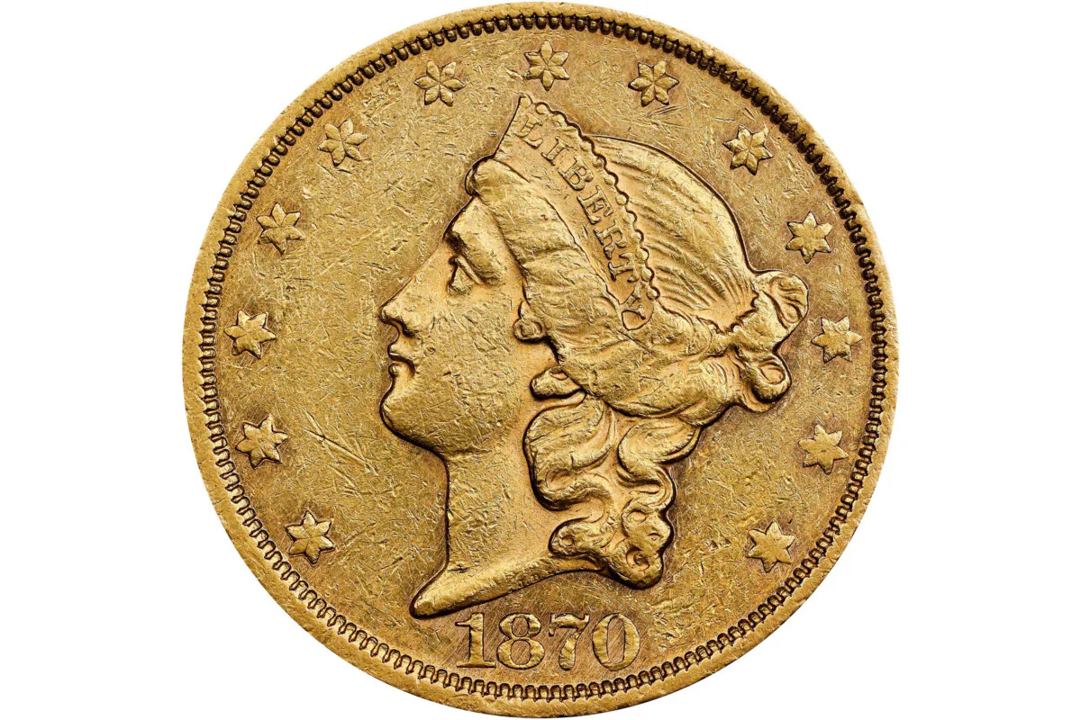 This photo provided by Stack's Bowers Galleries shows a rare $20 double eagle gold coin from 1870, which sold for $1,440,000 at an auction Tuesday, Nov. 19, 2024, in Costa Mesa, Calif. (Stack's Bowers Galleries via AP)