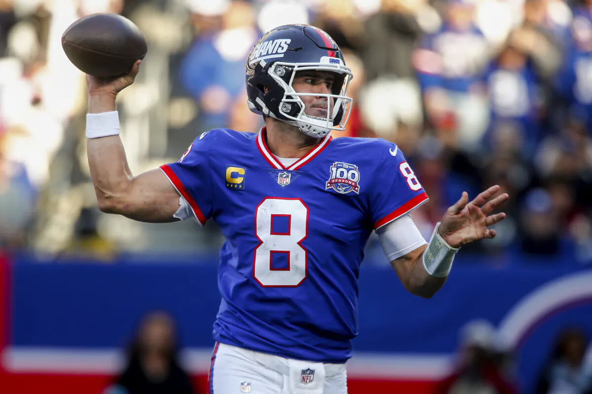 New York Giants quarterback Daniel Jones (8) passes the ball against the Washington Commanders during the third quarter of an NFL football game in East Rutherford, N.J., on Nov. 3, 2024. (John Munson/AP Photo)