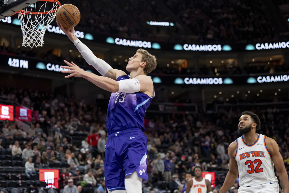 Utah Jazz forward Lauri Markkanen goes to the hoop ahead of New York Knicks center Karl-Anthony Towns (32) during the second half of an NBA basketball game, Saturday, Nov. 23, 2024, in Salt Lake City. (Spenser Heaps/AP Photo)