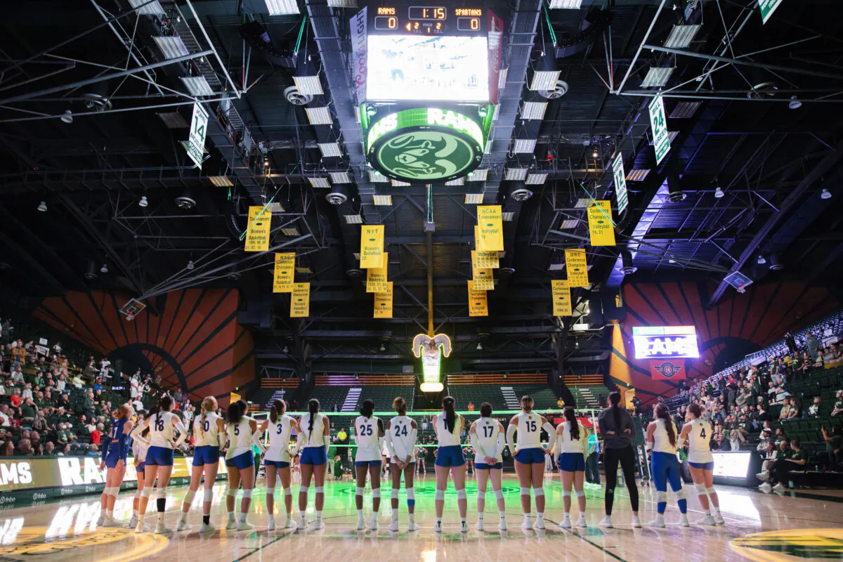 The San Jose State University Spartans line up for the playing of the national anthem and player introductions for their NCAA Mountain West women's volleyball game against the Colorado State University Rams in Fort Collins, Colo., on Oct. 3, 2024. (Santiago Mejia/San Francisco Chronicle via AP)