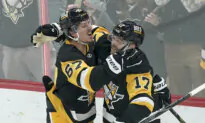 Rust Helps Penguins Beat Canucks 5–4 to Snap Three-Game Skid