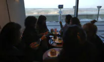 Customers at This Starbucks Can Sip Coffee and Observe a Quiet North Korean Village