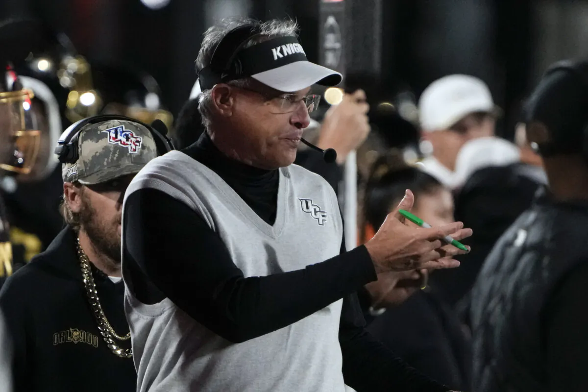 Central Florida head coach Gus Malzahn directs his team during the second half of an NCAA college football game against Utah, Friday, Nov. 29, 2024, in Orlando, Fla. (AP Photo/John Raoux)