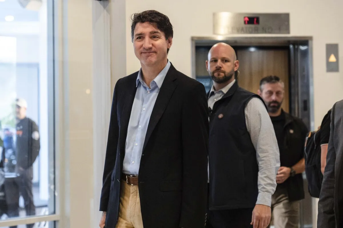 Canada Prime Minister Justin Trudeau walks through the lobby of the Delta Hotel by Marriott in West Palm Beach, Fla., on Nov. 30, 2024. (Carolyn Kaster/AP Photo)