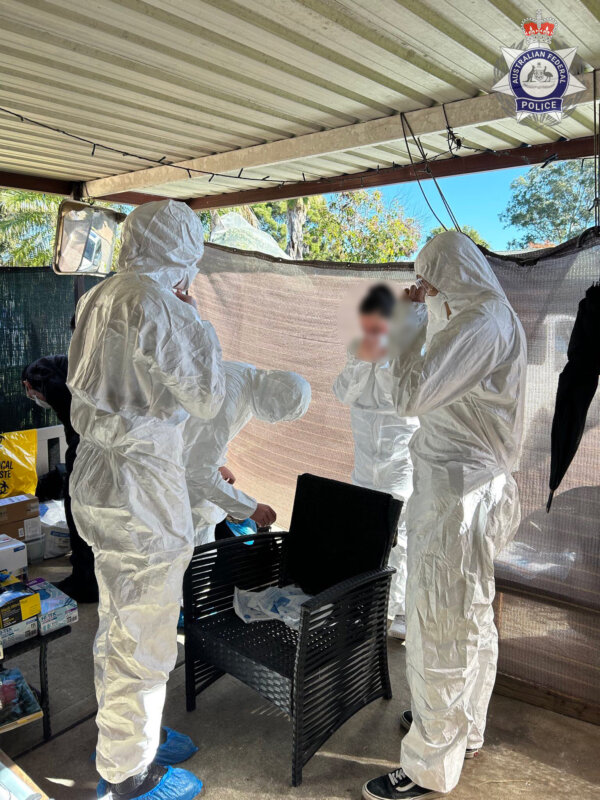 AFP forensics officers at a nitazene-related arrest in Western Sydney in an undated photo.