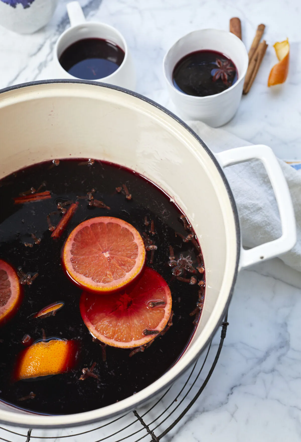 This mulled wine recipe is for German glühwein, which literally translates to ‘glow wine’ because of how you feel after you’ve been drinking tiny mugs outside in December. (Leela Cyd/TCA)