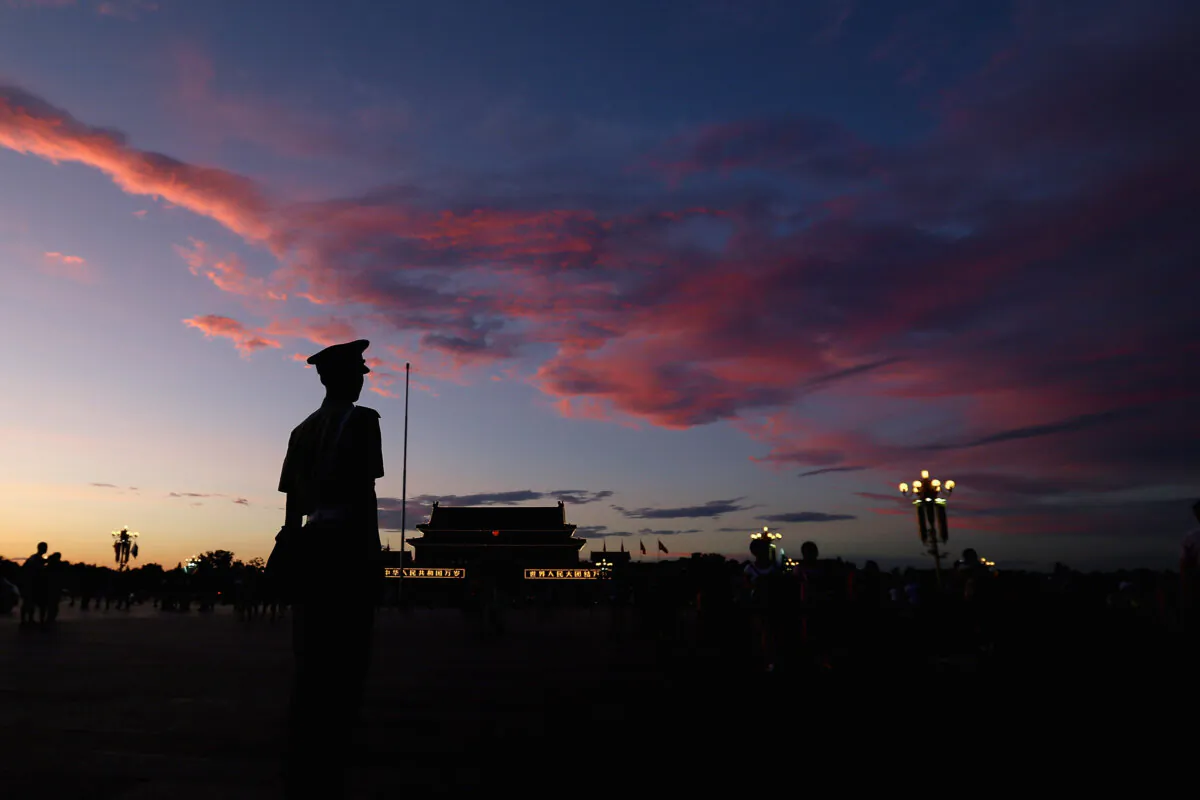 A Chinese paramilitary policeman stands guard at Tiananmen Square in Beijing, in this file photo. (Feng Li/Getty Images)