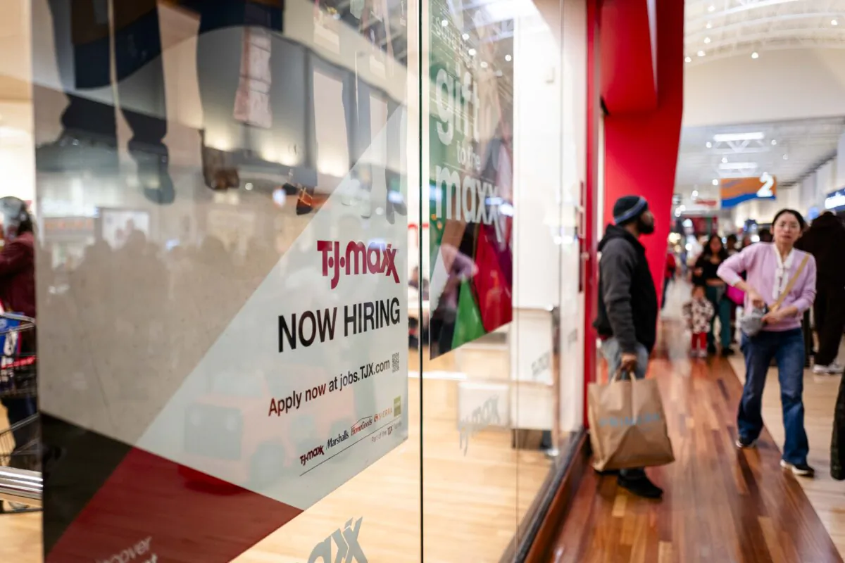 A now hiring sign during Black Friday at a mall in Hanover, Md., on Nov. 29, 2024. (Madalina Vasiliu/The Epoch Times)