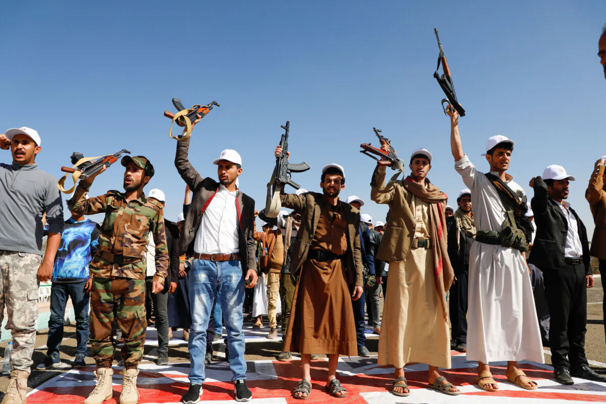 Newly recruited members of the Houthi terrorist group attend a protest march against the United States and Israel in Sanaa, Yemen, on Feb. 21, 2024. (AP Photo/Osamah Abdulrahman)