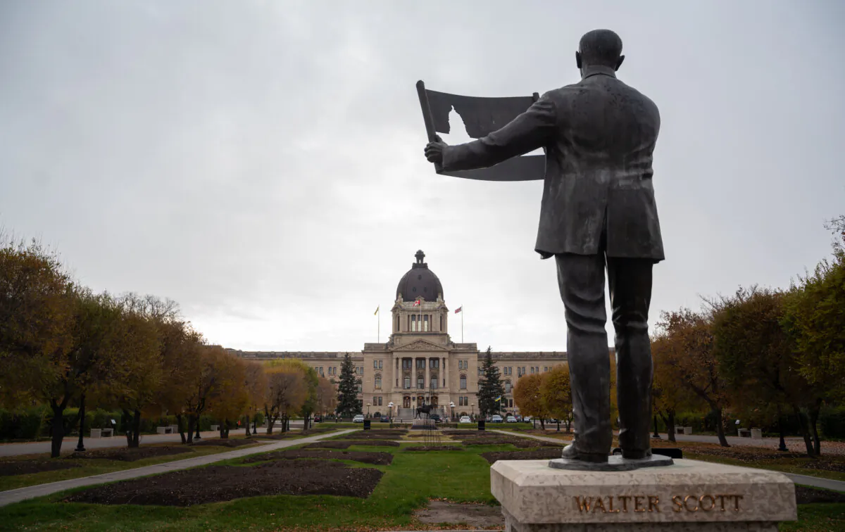 The Saskatchewan legislative building in front of Walter Scott Memorial in Regina on Oct. 24, 2024. (The Canadian Press/Heywood Yu)