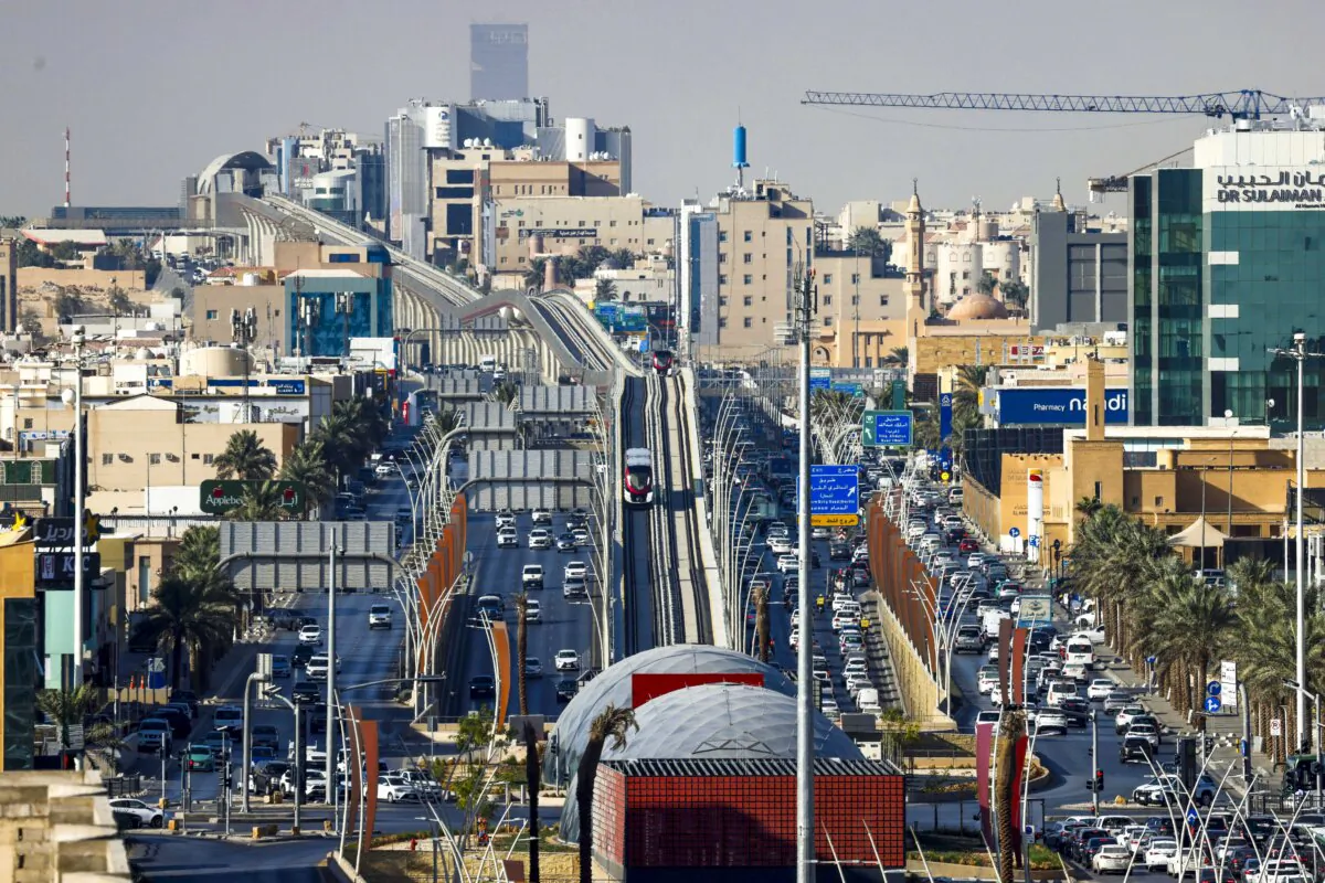 Riyadh Metro trains travel along tracks in the middle of a road in Riyadh, Saudi Arabia. (Ludovic Marin /AFP via Getty Images)
