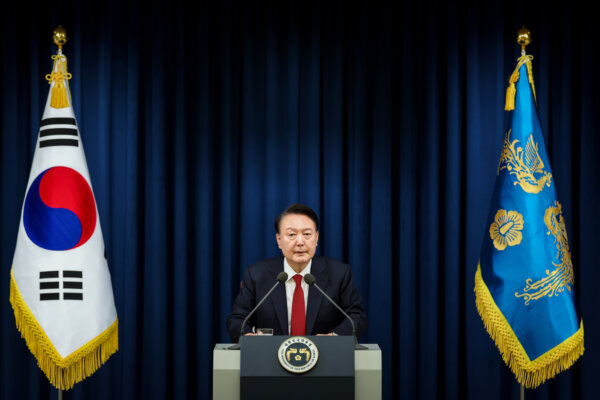 Day in Photos: Martial Law, Murder Trial, and Rescue at Sea