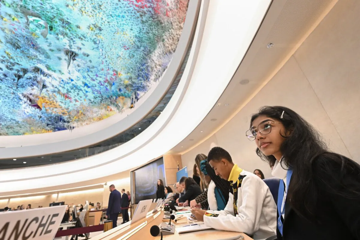 A youth advocate looks on prior to a panel on children's rights and the digital environment to mark the annual day of the child, at the 52nd UN Human Rights Council in Geneva, on March 10, 2023. (Fabrice Coffrini/AFP via Getty Images)