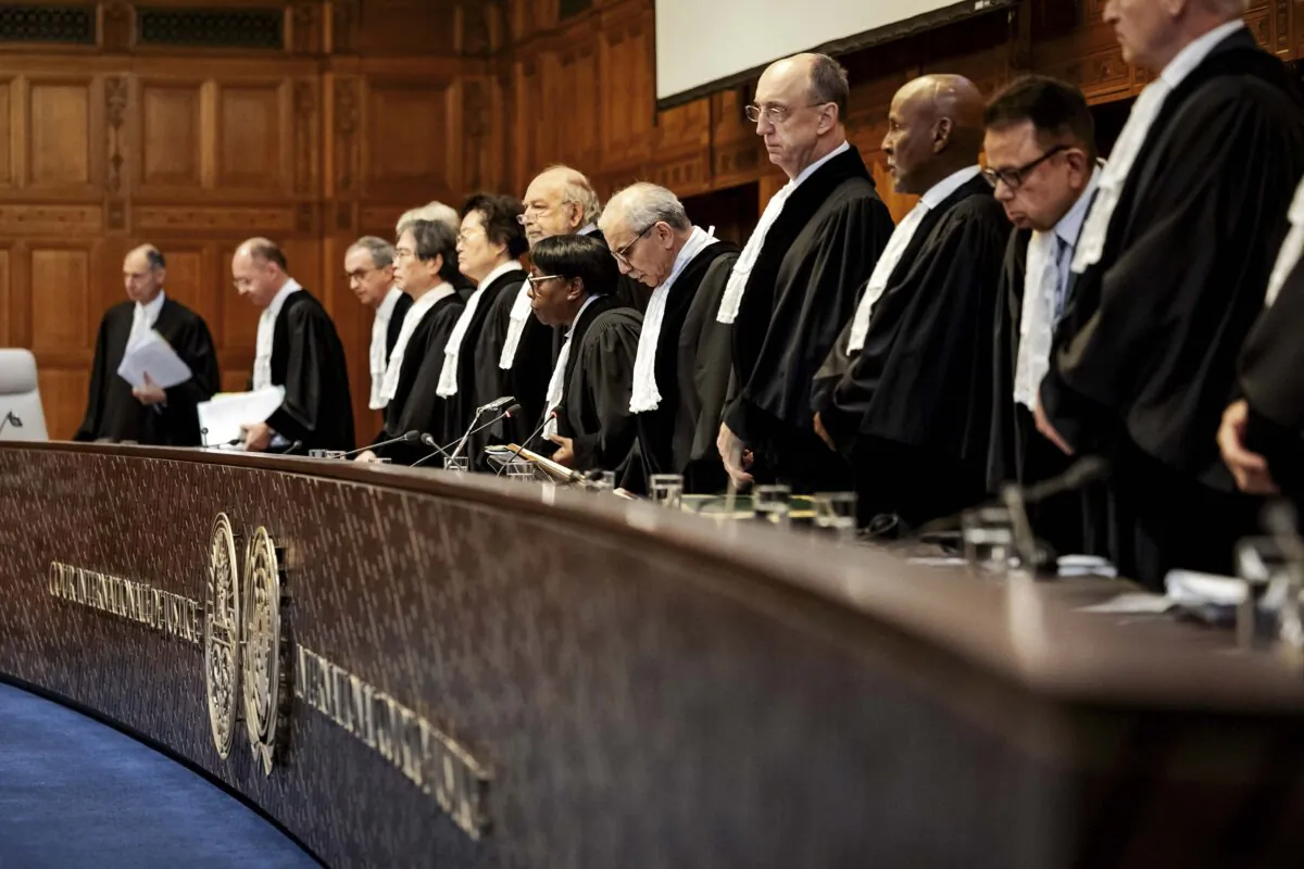 The court rises during a hearing at the International Court of Justice, as part of the proceedings aiming to set a legal framework on how countries should tackle climate policy, in The Hague, Netherlands, on Dec. 4, 2024. (Robin van Lonkhuijsen/ANP/AFP via Getty Images)