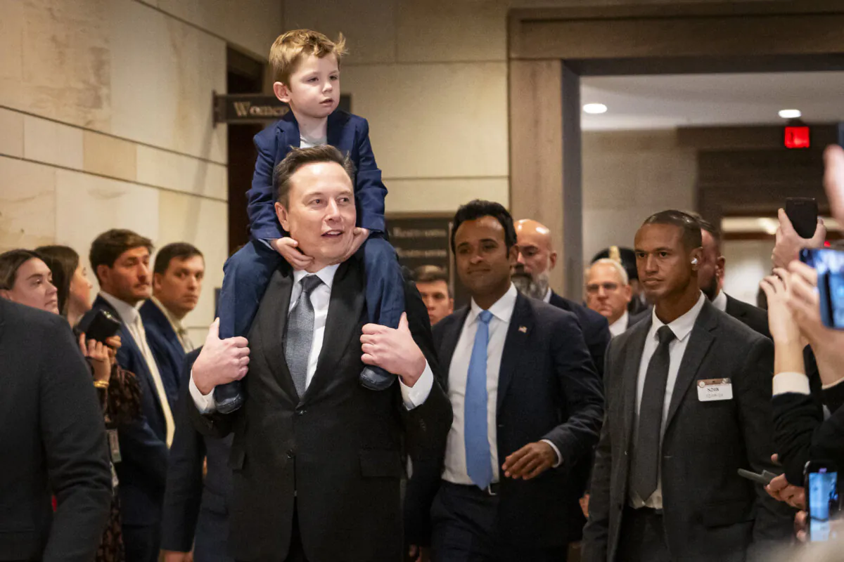 Elon Musk, CEO and Chief Engineer of SpaceX, and biotech entrepreneur Vivek Ramaswamy arrive ahead of a meeting with House Speaker Mike Johnson in Congress in Washington on Dec. 5, 2024. (Madalina Vasiliu/The Epoch Times)