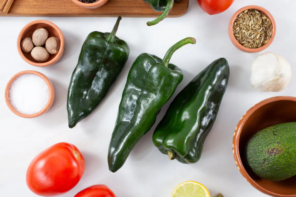 The Mexican specialty of roasted poblano chiles is a crowd pleaser. (David Tonelson/Dreamstime/TNS)