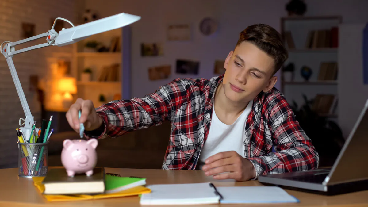 Teenagers can learn to save money. (Motortion Films/Shutterstock)