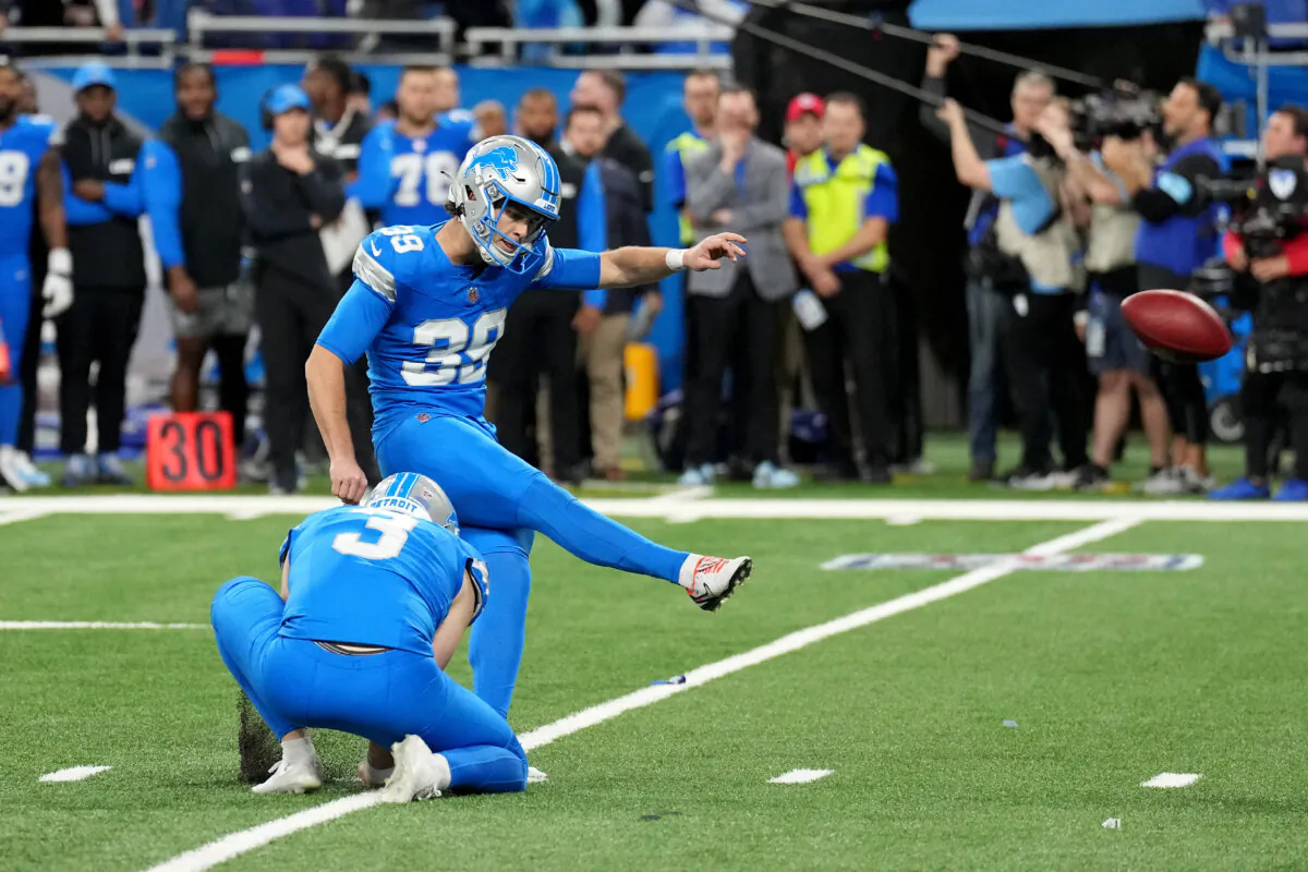 Jake Bates (39) of the Detroit Lions kicks a 35 yard game winning field goal against the Green Bay Packers during the fourth quarter in the game at Ford Field in Detroit, Michigan on Dec. 5, 2024. (Nic Antaya/Getty Images)