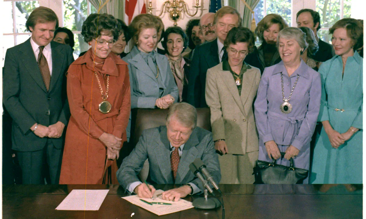 President Jimmy Carter signs H.J.Res.638 extending the deadline for the ratification of the Equal Rights Amendment (ERA) on Oct. 20, 1978. (U.S. National Archives and Records Administration)