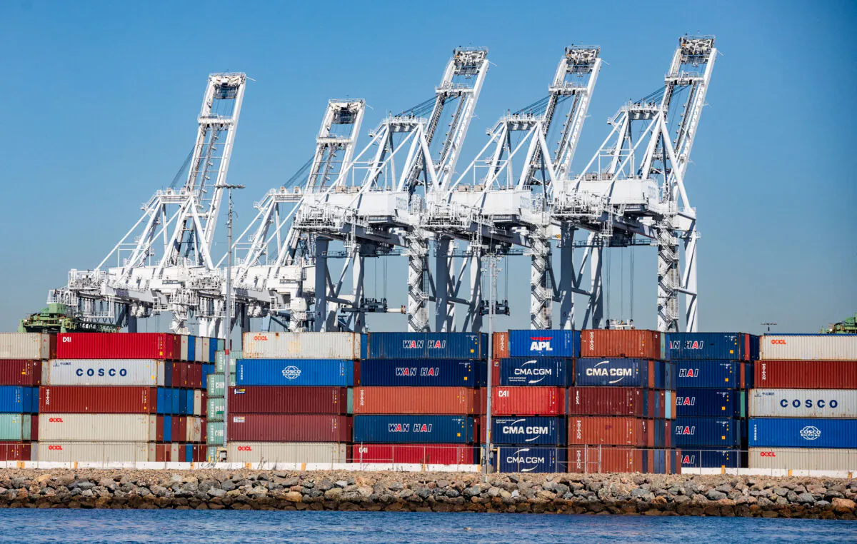 Vessels line the horizon waiting to offload containers into the Ports of Los Angeles and Long Beach, Calif., on Oct. 27, 2021. (John Fredricks/The Epoch Times)