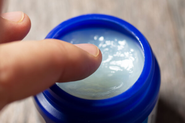 Aromatic chest rubs, such as Vicks VapoRub, are common to alleviate congestion. Incorporating herbal essential oils into a base salve recipe creates a natural version that soothes irritated noses, stuffed sinuses, and chest congestion. Depending on the herb used, it can help ease breathing by opening tight lungs and respiratory passages.