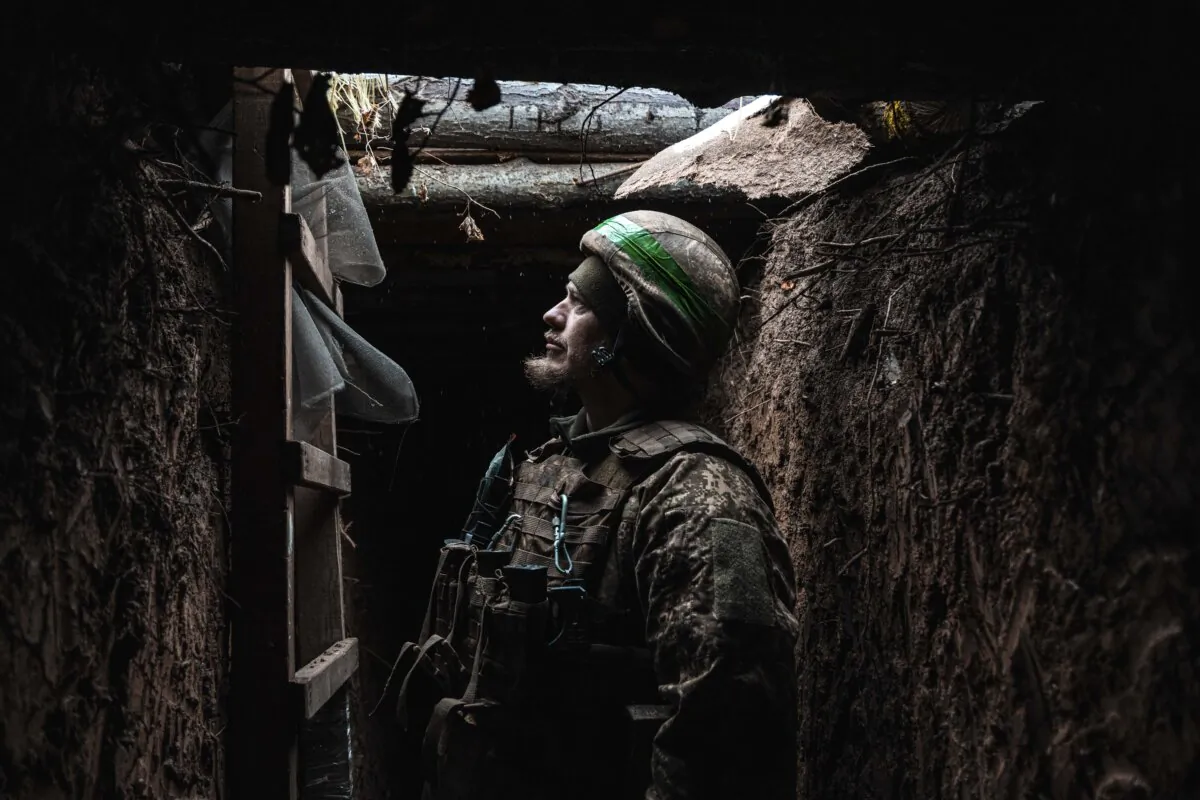 A soldier of 13th Khartiia Brigade in a trench during a snowstorm in Kharkiv, Ukraine, on Dec. 6, 2024. (Nikoletta Stoyanova/Getty Images)