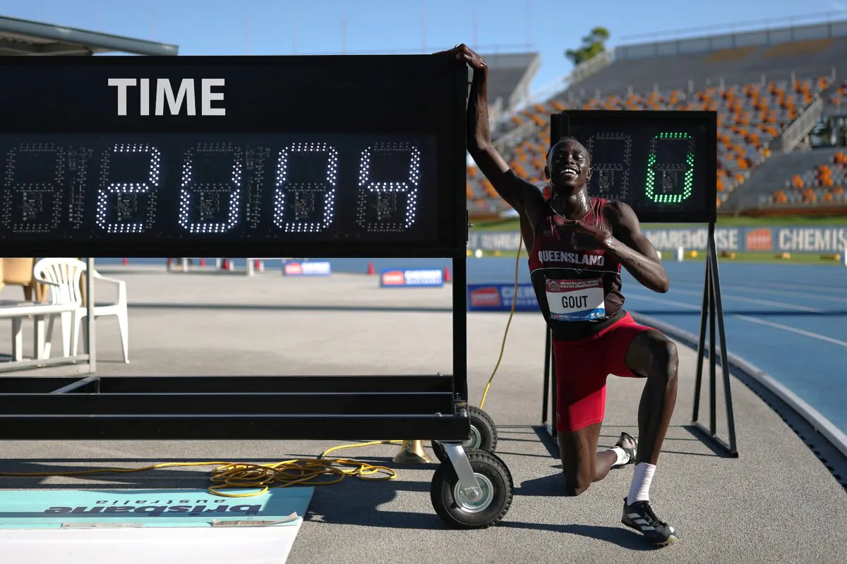 Gout Gout of Queensland celebrates winning the Boys' U18 200m Final in a new national record time of 20.04 seconds during the 2024 Chemist Warehouse Australian All Schools Athletics Championship at Queensland Sport and Athletics Centre in Brisbane, Australia on Dec. 7, 2024.Cameron Spencer/Getty Images)