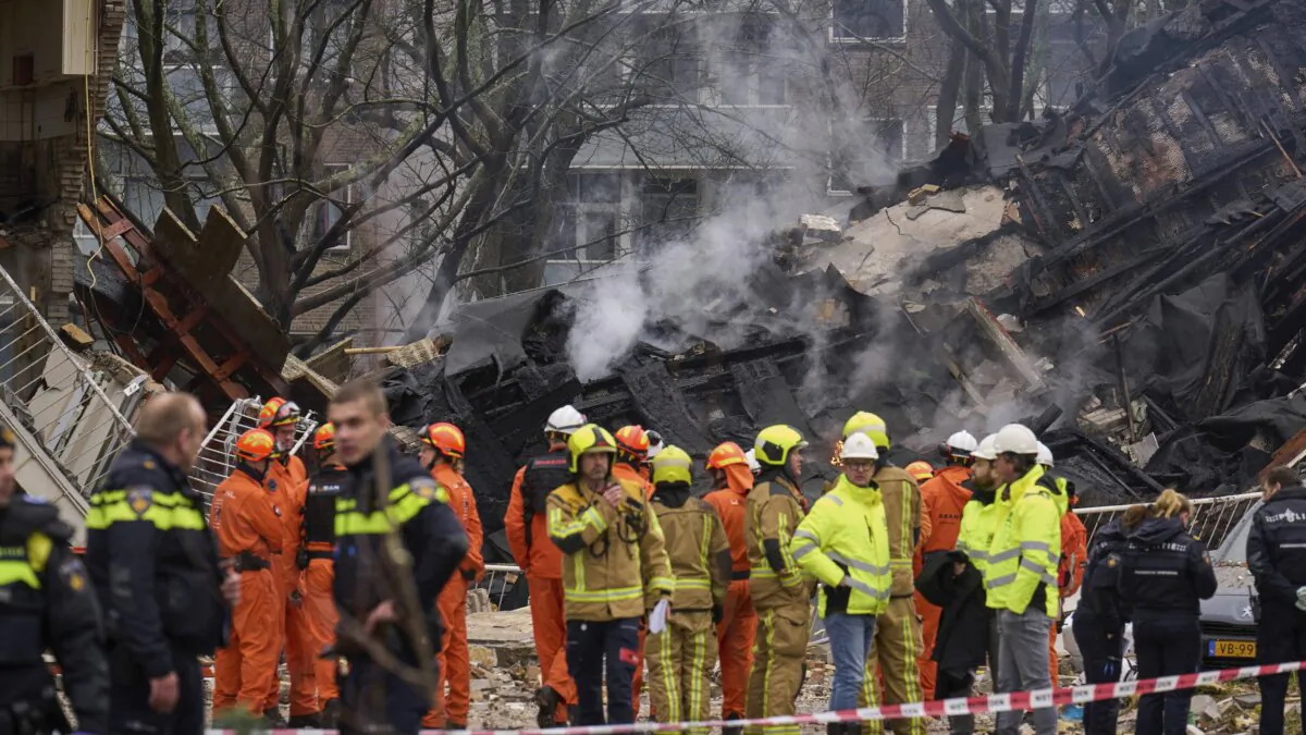 Firefighters stand by a building destruction at the site of an explosion which destroyed several apartments and injured multiple people, at The Hague, on Dec. 7, 2024. (Phil Nijhuis/AP Photo)