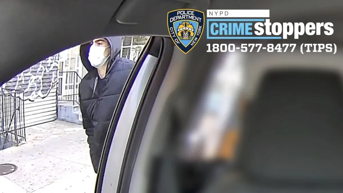 A suspect in the fatal shooting of UnitedHealthcare CEO Brian Thompson outside of a taxi in an undated photo. (NYPD via AP)
