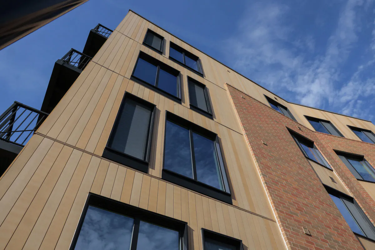 The facade of the Passive House apartment building in Exton includes brick and composite siding that is 100 percent tree-free, sustainable, and renewable. (Steven M. Falk/The Philadelphia Inquirer/TNS)