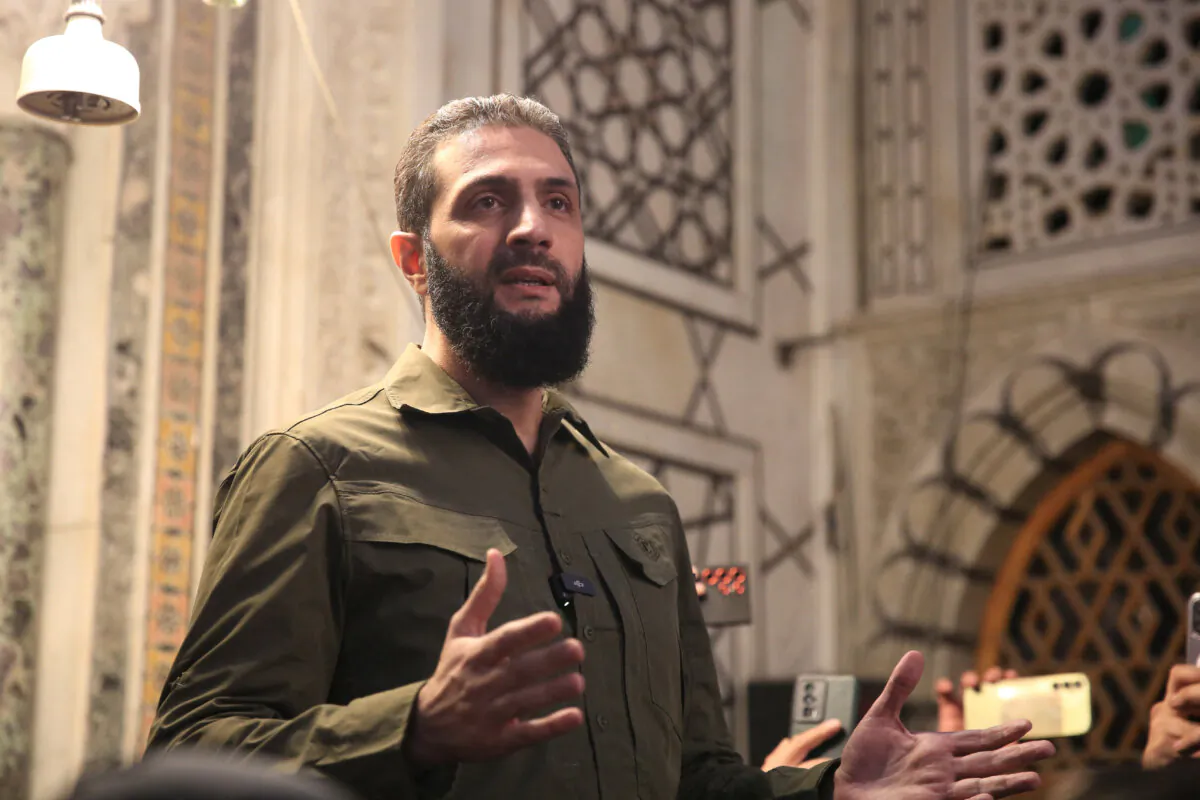 The leader of Hayat Tahrir al-Sham (HTS), Ahmed al-Sharaa, formerly known as Abu Mohammed al-Golani, addresses a crowd at the Umayyad Mosque in Damascus, Syria, on Dec. 8, 2024. (Aref Tammawi/AFP via Getty Images)